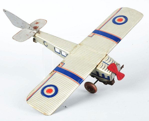 Tin Litho Airplane Wind-Up Toy.: English. American. Marked "Made in England". Single wing with original propeller. Some litho loss and bending to rear tail fins. Condition (Very Good). Size 14 - 1/2" Wingspan.
