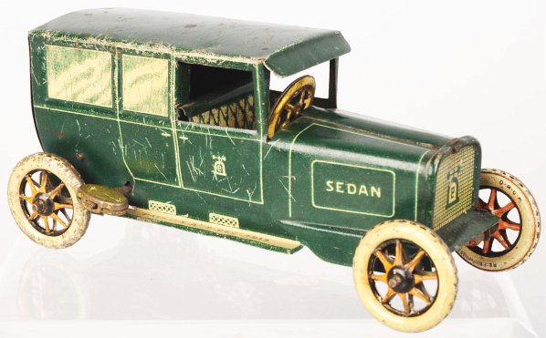 Tin Litho Lehmann Sedan Wind-Up Toy.: German. Working. Lehmann bell mark on both front doors and rear. Some small denting to roof and scratching throughout. Condition (Good - Very Good). Size 5 - 1/2" L.
