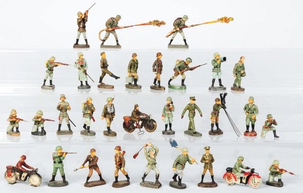Lineol & Elastolin Miscellaneous Toy Soldiers.: Includes approximately 30 figures and three small motorcycles. Condition (Good).