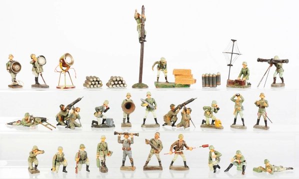 Lineol & Elastolin German Army in Action Figures.: Includes approximately 27 soldiers plus battlefield accessories. Some of the soldiers are better figures and some have cracks and paint wear. Condition (Good - Very Good).