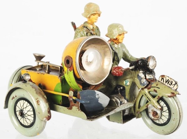 Elastolin German Army Communications Motorcycle.: With operating searchlight and Morse code unit. Some paint wear. Condition (Good - Very Good). Size 7 cm.