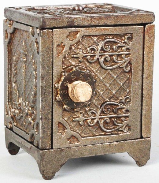 Cast Iron Kenton Savings Deposit Still Bank.: American. Marked "Made by the Kenton Hardware Company Denton, Ohio" on bottom. Combination lock on front, embossed "Kenton Brand" on back, and embossed "Savings Deposit" on top. Replaced screw and nut
