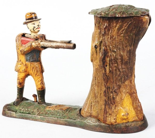 Cast Iron Teddy & the Bear Mechanical Bank.: Manufactured by J. & E. Stevens and Company. Working. Condition (Excellent). Size 10" L.