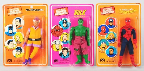 Lot of 3: Mego Superhero Figures.: Includes one Spiderman figure, dated 1979, unpunched on card, one Incredible Hulk figure, dated 1978 Marvel Comics Groups, unpunched on card, and one Mr. Mxyzptek (enemy of Batman), marked "DC Comics 