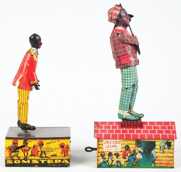 Lot of 2: Tin Litho Roof Dancing Wind-Up Toys.: American. Working. Includes Marx Som Stepa and Unique Art Jazzbo Jim with original arms and banjo. The roof on the Jazzbo Jim toy needs to be tabbed back on and has some oxidation. Minor scratching an