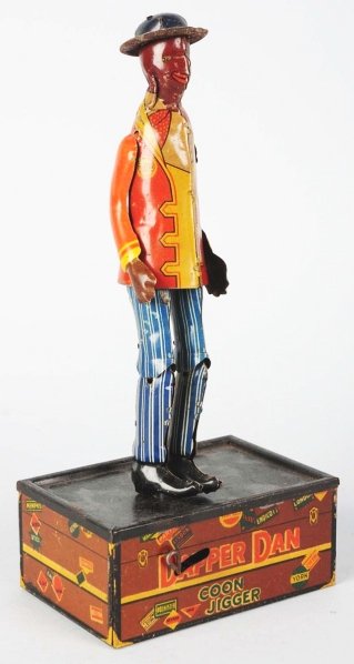 Tin Litho Marx Dapper Dan Roof Dancer Wind-Up Toy: American. Working. Variation with base that looks like a suitcase. Original arms and figure is similar to the Span. Some scratching and wear overall. Condition (Very Good). Size 9 - 1/2" T.
