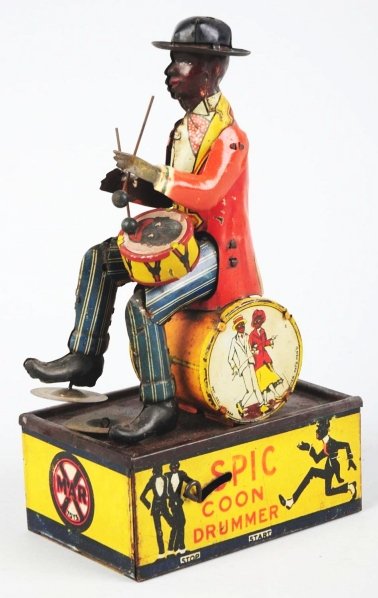 Tin Litho Marx Spic Drumming Wind-Up Toy.: American. Working. Scarce toy with original cymbals. Drum has been replaced, along with arms and drumsticks. Some fading and scratching throughout. Condition (Good - Very Good). Size 8 - 1/2" T.