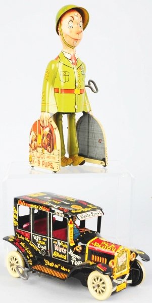 Lot of 2: Tin Litho Wind-Up Toys.: American. Working. Includes one Marx Old Jalopy sedan and one Unique Art GI Joe and the K-9 Pups walking toy. Both have minor scratching and wear. Condition (Very Good - Excellent). Size Largest: 9" T