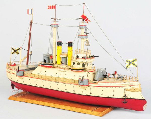 Hand-Painted Tin Petropavlovsk Boat Toy.: Contemporary. Two-stack battleship with name painted on front. This was not made with a mechanism. Appears to be a crude, newer copy of an early 20th century Marklin Battleship. Condition (Excellent).