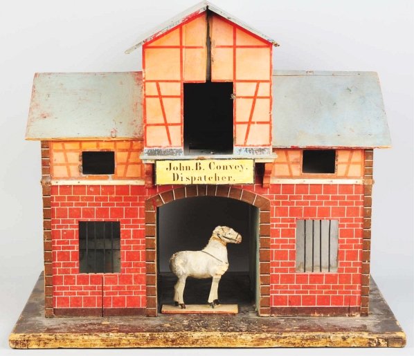 Large Wooden Horse Stable Toy.: German. Pre-war, circa 1920. Includes one small paper mache and wood horse toy on platform. Stable's sign reads "John B. Convey Dispatcher". Horse is missing tail and has some cracking and damage thro