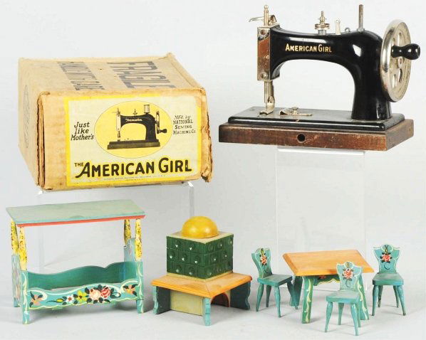 Child's Sewing Machine & Dollhouse Furniture.: Includes an American Girl sewing machine marked "The National Sewing Machine Company Illinois". Appears to be a functioning sewing machine. Also includes a box of six German wooden painted dollhouse f