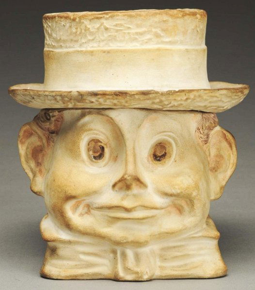 Brownie Head Candy Container.: Only some painting to back of head, hair, and base. Front has no paint remaining. Condition (Good - Very Good). Size 5 - 1/4" T.