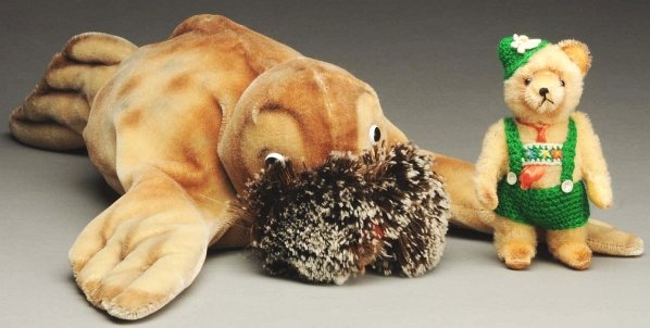 Lot of 2: Stuffed Mohair Animals.: Includes one Steiff walrus with glass eyes and one small German teddy bear (possibly Steiff). Condition (Very Good). Size Largest: 27" L.