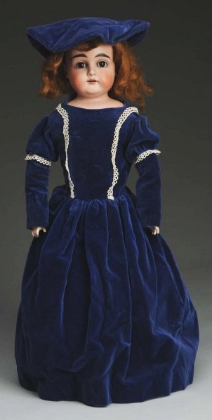 German Bisque Child Doll.: Shoulder head incised “28.5 118” with J.D. Kestner look, dark multi-stroked eyebrows, brown sleeping eyes, painted upper and lower eyelashes, open mouth, replaced wig; original kid body with rivet