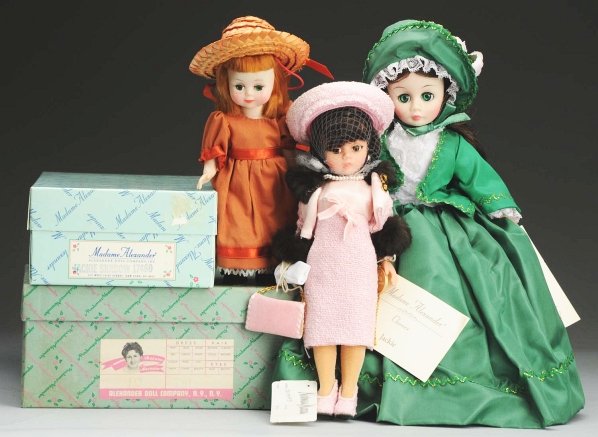 Lot of 3 Alexander Dolls.: Hard Plastic 1960s “Maggie Mix-Up” bent-knee walker with red hair, green sleep eyes, freckles and closed mouth, factory original “Maggie” panties, socks and shoes, with a homemade cotton dress