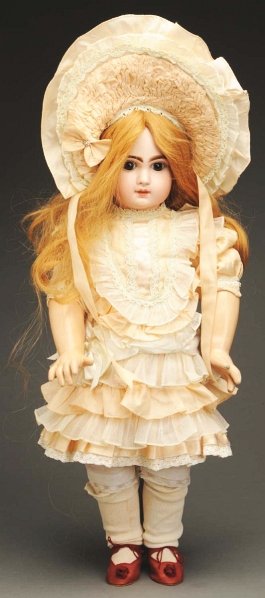 Lovely Early Bébé Jumeau Doll.: French bisque portrait-type socket head incised 11 with red and black Jumeau check marks (hairline middle of forehead, two hairlines above and below right ear), dark brown multi-stroked eyebrows, brow