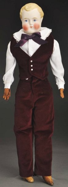 Parian Boy Doll.: German parian bisque unmarked shoulder head, blonde molded hair with side part and comb marks, tapered light brown eyebrows, blue painted eyes, red eyelid line, black eyelash line, closed mouth, red c