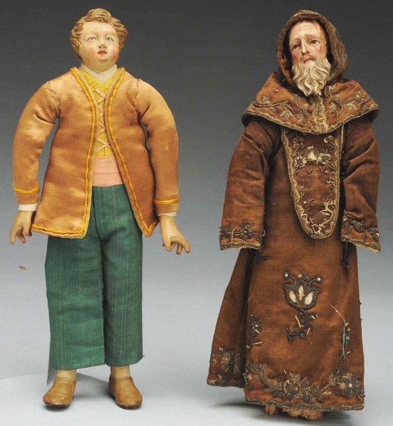 Lot of 2 Neapolitan Crèche Figures.: Man with terra cotta head, molded short wavy hair, round face, molded eye sockets with enameled eyes looking up, stiff body with terra cotta hands and lower legs with molded slippers, clothing may be
