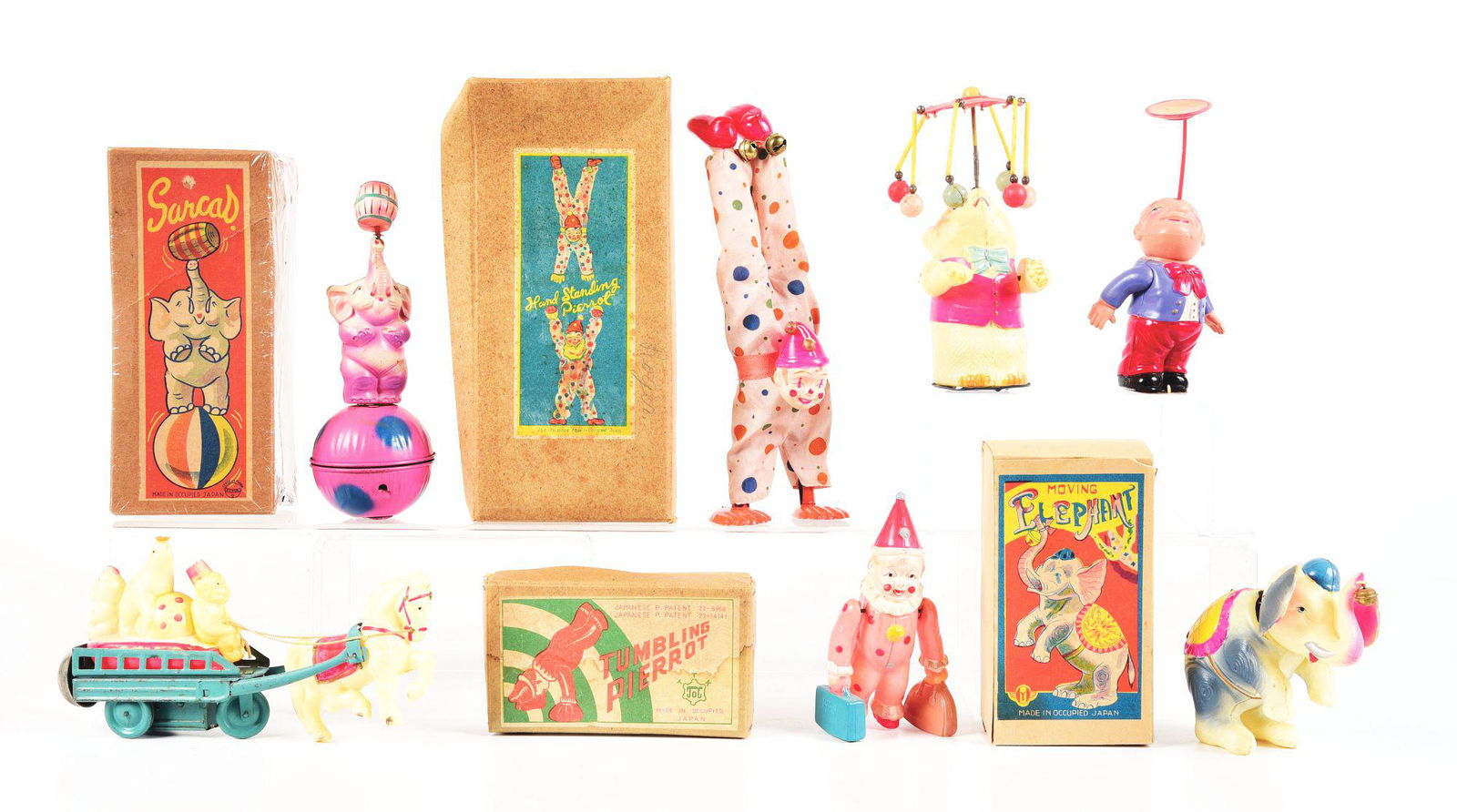 LOT OF 7: OCCUPIED JAPANESE CELLULOID WIND-UP TOYS. (1 of 2)