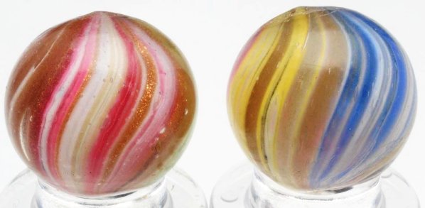 Lot of 2: Onionskin Lutz Marbles.: Includes one onionskin in pink, white, yellow, and blue with lutz and one onionskin in white, pink, and green with lutz. Condition (8.9 - 9.4). Size Each: 5/8" Dia.
