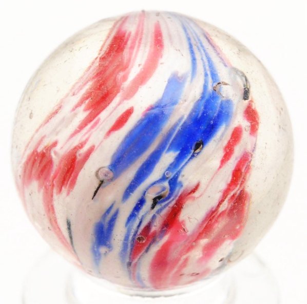 Shrunken Core Onionskin Marble.: Nice twisted onionskin with white base and spotting in blue and red. Faceted pontil. Condition (9.7). Size 25/32" Dia.