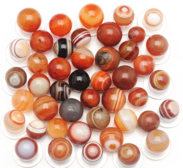Lot of 25: Hand-Made Agate Marbles.: Includes all hand-faceted Agate marbles, many with nice bullseye patterns. Condition (8.9). Size Range: 1/2" to 5/8" Dia.