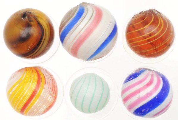 Lot of 6: Handmade Marbles.: Includes two peppermints, one double pontil slag, one coreless swirl, one clambroth, and one gooseberry. Minor chips throughout. Condition (8.8 - 8.9). Size Range: 9/16" to 3/4" Dia.
