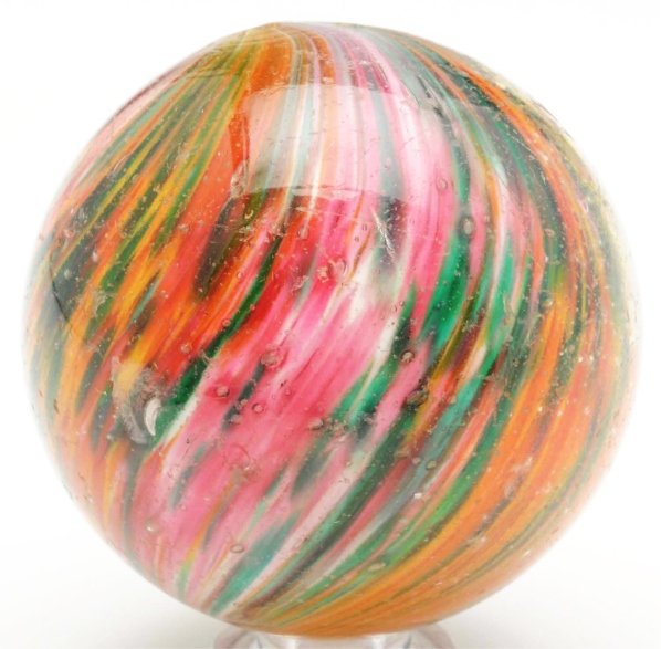 4-Paneled Onionskin Marble.: Two opposing panels of turquoise, pink, and white with two opposing panels of yellow, red, and turquoise. Faceted pontil. Surface has reflections and minor flea bites. Condition (8.6 - 8.7). Size 1 - 