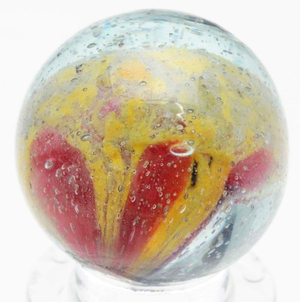 Small Single Pontil Cloud Marble.: Faceted single pontil with ghost yellow base, large red spotting, and some blue. Very attractive marble. Nice cup mark on top. Condition (9.7). Size 13/16" Dia.
