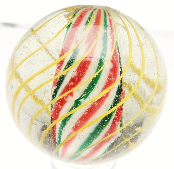 Large Solid Core Swirl Marble.: White solid core with red and green banding. Outer decoration consists of birdcage yellow latticino threads. Minor subsurface micro reflection. Condition (9.6). Size 1 - 3/4" Dia.