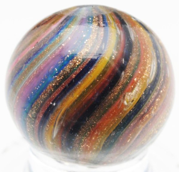 Onionskin Lutz Marble.: Very colorful onionskin lutz. Colors include pink, blue, yellow, light blue, green, turquoise, and orange with nice lutz throughout entire marble. Some as-made hot spots. Condition (9.3). Size 5/8" Di