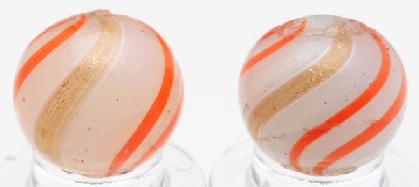 Lot of 2: White Semi-Opaque Banded Lutz Marbles.: White semi-opaque base with orange bands. One marble is in good condition while the other has one chip near bottom pontil. Condition (8.9). Size Both: 9/16" Dia.