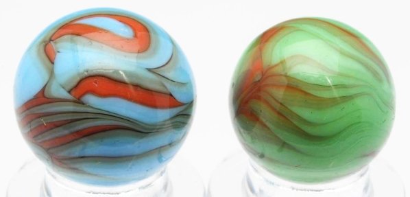 Lot of 2: Christensen Agate Flame Marbles.: Includes one with baby blue base with reddish-brown flame tips accented in chocolate brown. Also includes one green base with salmon flame tips. Condition (9.4). Size Each: 5/8" Dia.