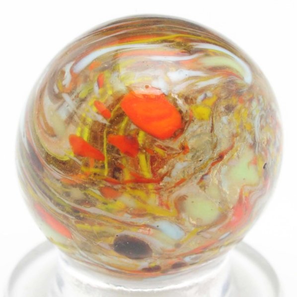 Christensen Agate Cyclone Guinea Marble.: Single pinch line Guinea with fine spotting and great submarine effect. This marble is slightly out of round. Condition (9.2). Size 11/16" Dia.