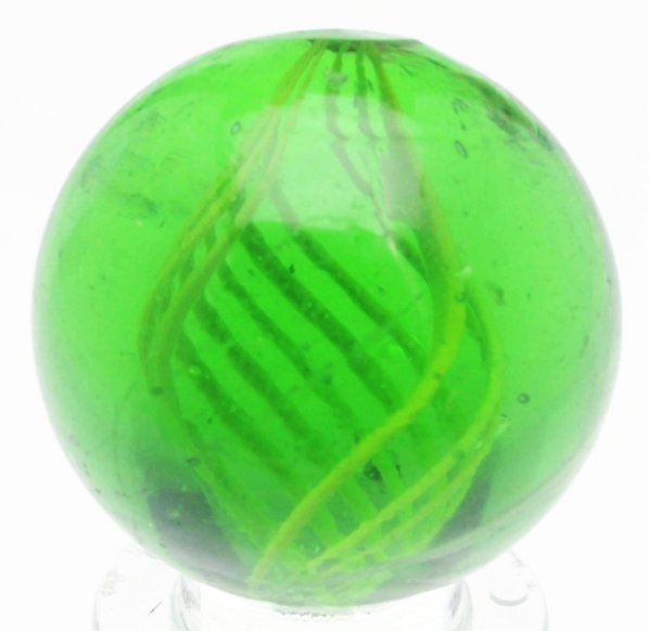 Green Glass Latticino Swirl Marble.: White latticino bands in green glass. This marble has one outer band, just under the green surface. Faceted pontil. Condition (9.3). Size 15/16" Dia.