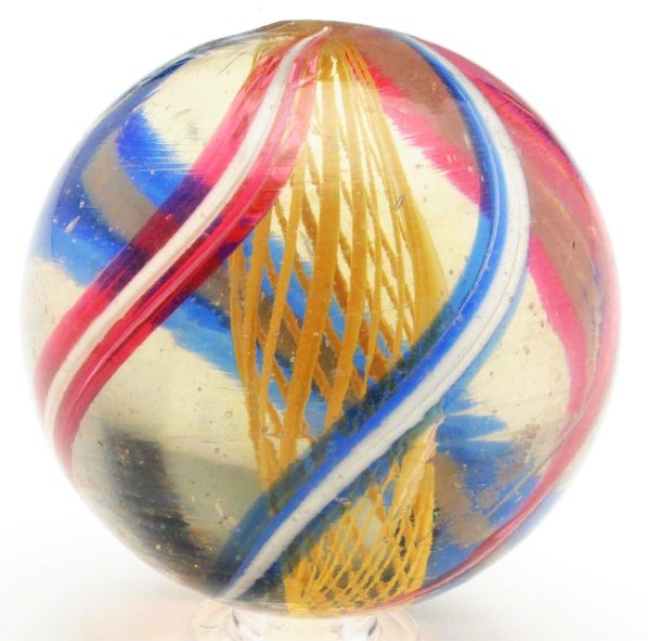 Yellow Latticino Swirl Marble.: Outer decoration of white bands accented in translucent red and alternating with white bands accented in blue translucent bands. Condition (9.2). Size 1 - 7/8" Dia.