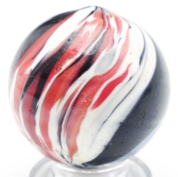 Paneled Indian Marble.: Black opaque marble with one panel of broad pink and white opposing one solid baby blue panel. Condition (9.1). Size 15/16" Dia.