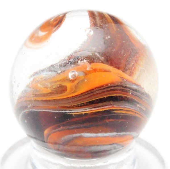 Christensen Agate Cyclone Marble.: Orange, baby blue, and some chocolate brown. Minor flea bite and one as-made indentation. Condition (8.95). Size 5/8" Dia.