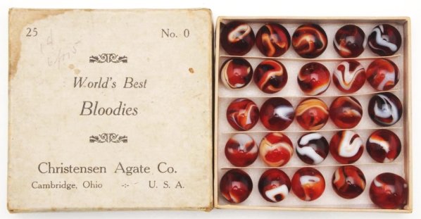 Christensen Agate No. 0 Marble Box Set.: "World's Best Bloodies."Box set contains 25 bloody marbles. Box is missing cotton and wax insert and dividers are contemporary. Also, box top has staining in upper left corner and some edge wear. Cond