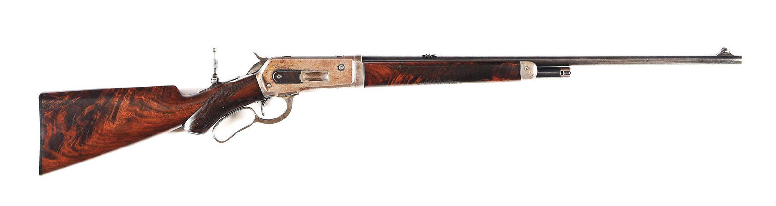 (A) WINCHESTER DELUXE MODEL 1886 .33 WCF LEVER ACTION RIFLE.: Made by Winchester Repeating Arms Company in 1896. Blued standard 24" round Winchester Steel barrel with integral blade front sight and Lyman No. 6 2-leaf fold-down dovetail adjustable rear sight. Lym