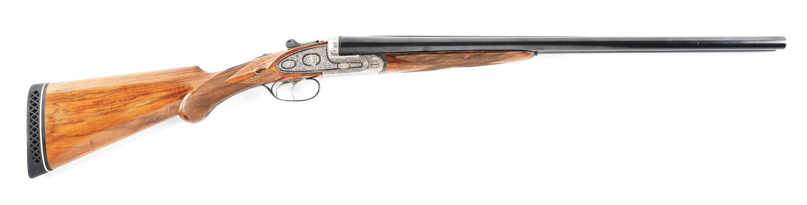 (C) CASED UNION ARMERA MODEL 217RB 12 BORE SIDE BY SIDE SHOTGUN WITH NUMBERED 2 BARREL SET.: L1 date code on barrels for 1966. 27" chopper lump barrels with "Union Armera S.L. Eibar (Made in Spain)" on the right tube, "Monte V. Cloyd" on left. Underside of barrels and barrel flats with variou