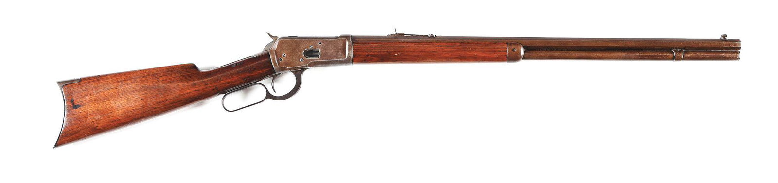 (A) WINCHESTER MODEL 1892 LEVER ACTION RIFLE.: Winchester Model 1892 made by Winchester Repeating Arms in 1894. Standard 24" octagon Steel barrel with standard sights and Winchester Address with .38 W.C.F. caliber marking. Standard Winchester brig