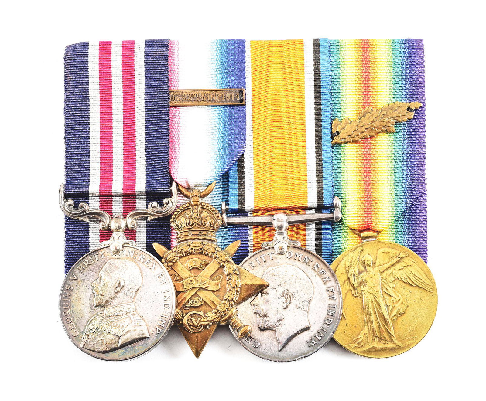 BRITISH WWI MEDAL BAR WITH MILITARY MEDAL NAMED TO BOMBARDIER MICHAEL BARRY, ROYAL ARTILLERY, WIA.: A nice British World War I medal bar named to Bombardier Michael Barry. The bar consists of his Military Medal impressed in small sans-serif capitals "30241 A.BMBR: M. BARRY. 113/HY BY: R.G.A.", 1914 