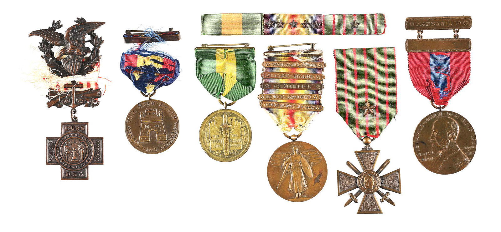 FANTASTIC SPANISH AMERICAN WAR-WWI MEDAL GROUPING NAMED TO A MEMBER OF HUNTINGTON'S FIRST MARINE: An excellent medal grouping that spans from the Spanish American War-World War I named to a member of Colonel Robert Watkinson Huntington's First Marine Battalion. The group includes a Sampson Medal w