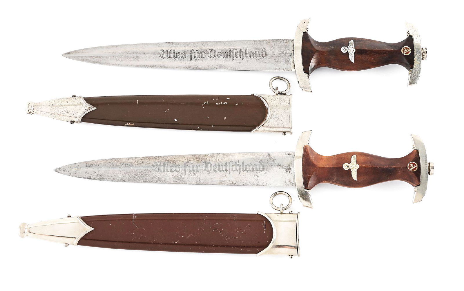 LOT OF 2: THIRD REICH SA DAGGERS.: Lot consists of: (A) Third Reich SA dagger with "RZM M7/42" marked nickel-plated steel blade with light runner and scattered marks, light freckling, and evidence of polishing. The acid-etched "Alles f