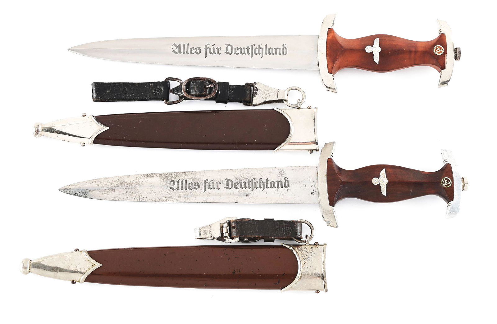 LOT OF 2: THIRD REICH SA DAGGERS.: Lot consists of: (A) Third Reich SA dagger with "RZM M7/56" marked nickel-plated steel blade with runner and light marks, and nice cross-graining. The acid-etched "Alles fur Deutschland" motto is nice