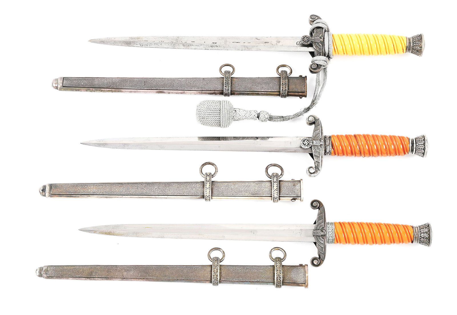 LOT OF 3: THIRD REICH HEER DAGGERS.: Lot consists of (A) Heer dagger with "WKC SOLINGEN" marked blade with nice cross graining, moderate runner and scattered marks, and scattered blemishes. Nickel silver plated fittings retain nice amoun