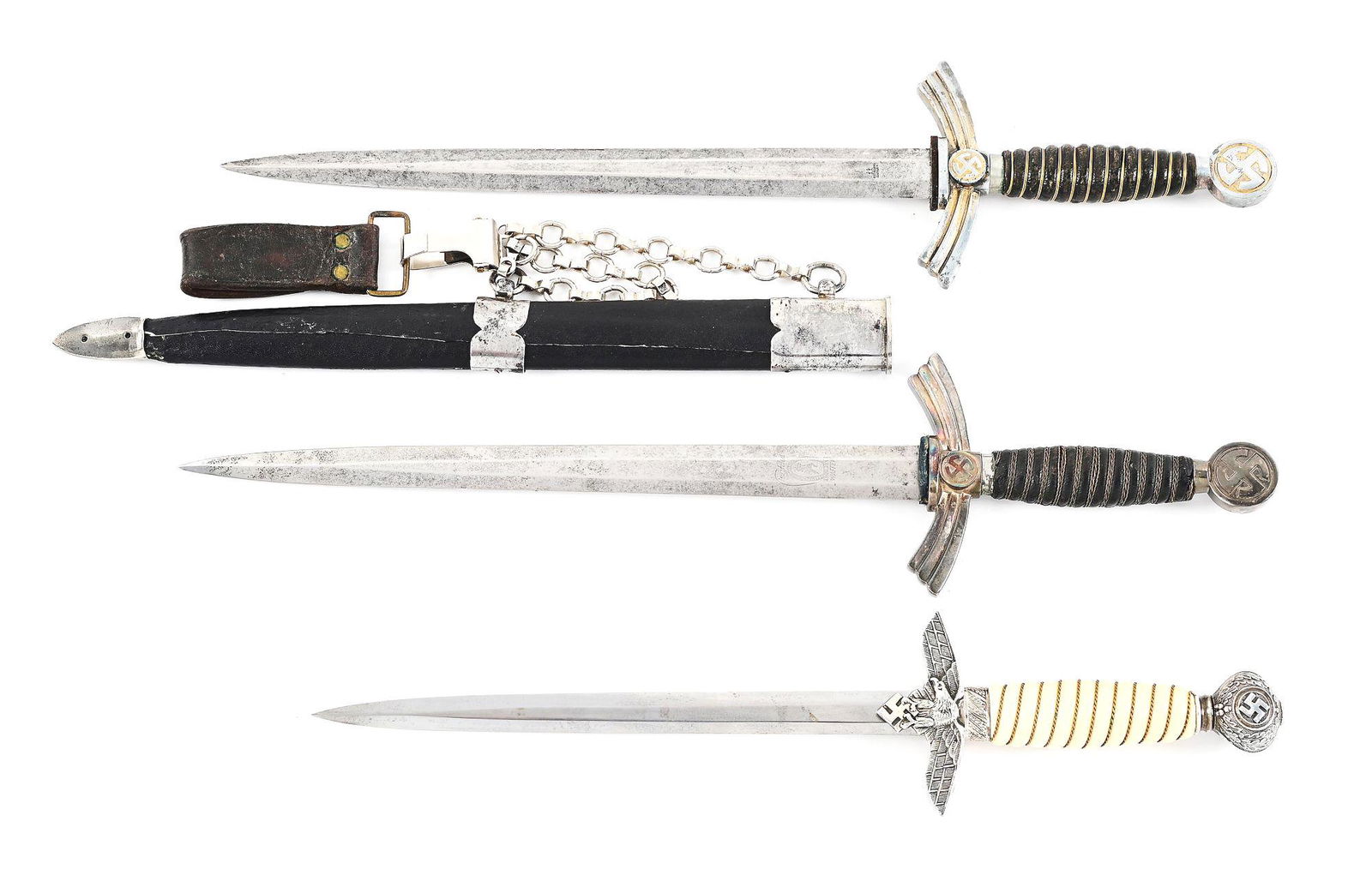 LOT OF 3: 2 FIRST AND 1 SECOND MODEL LUFTWAFFE DAGGERS.: Lot consists of: (A) Luftwaffe 1st model dagger with a "ROBI KLASS SOLINGEN" marked blade with runner marks, blemishes throughout, and a heavier patina. Fittings exhibit heavy patina with evidence of