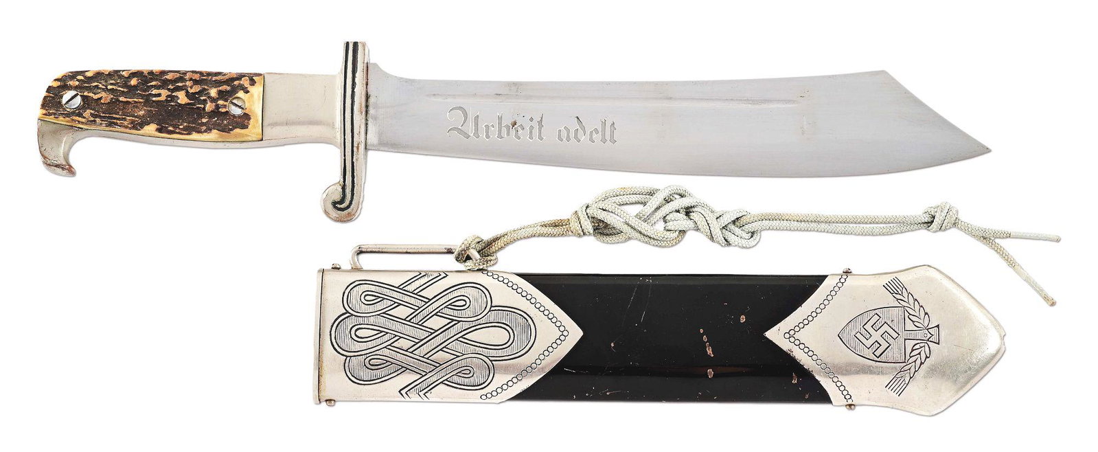 THIRD REICH RAD HEWER BY WITH STAG GRIP.: Third Reich RAD Hewer with a "WILH. WAGNER SOLINGEN MERSCHED", and "RJAD" in triangle, marked steel blade, with light scattered marks. Areas of visible cross-graining with what appears to be in origin