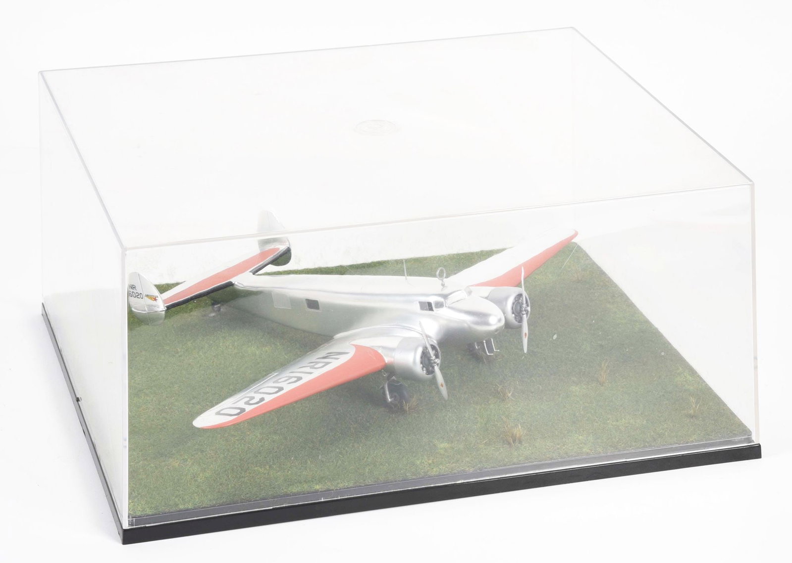 SPECIAL HOBBY 1/72 SCALE AMELIA EARHART LOCKHEED ELECTRA 10-E PLASTIC MODEL.: Assembled Special Hobby 1/72 scale Lockheed Electra 10-E which is painted and decaled to resemble the aircraft of the renowned and ill-fated aviator Amelia Earhart. The model is constructed of plastic